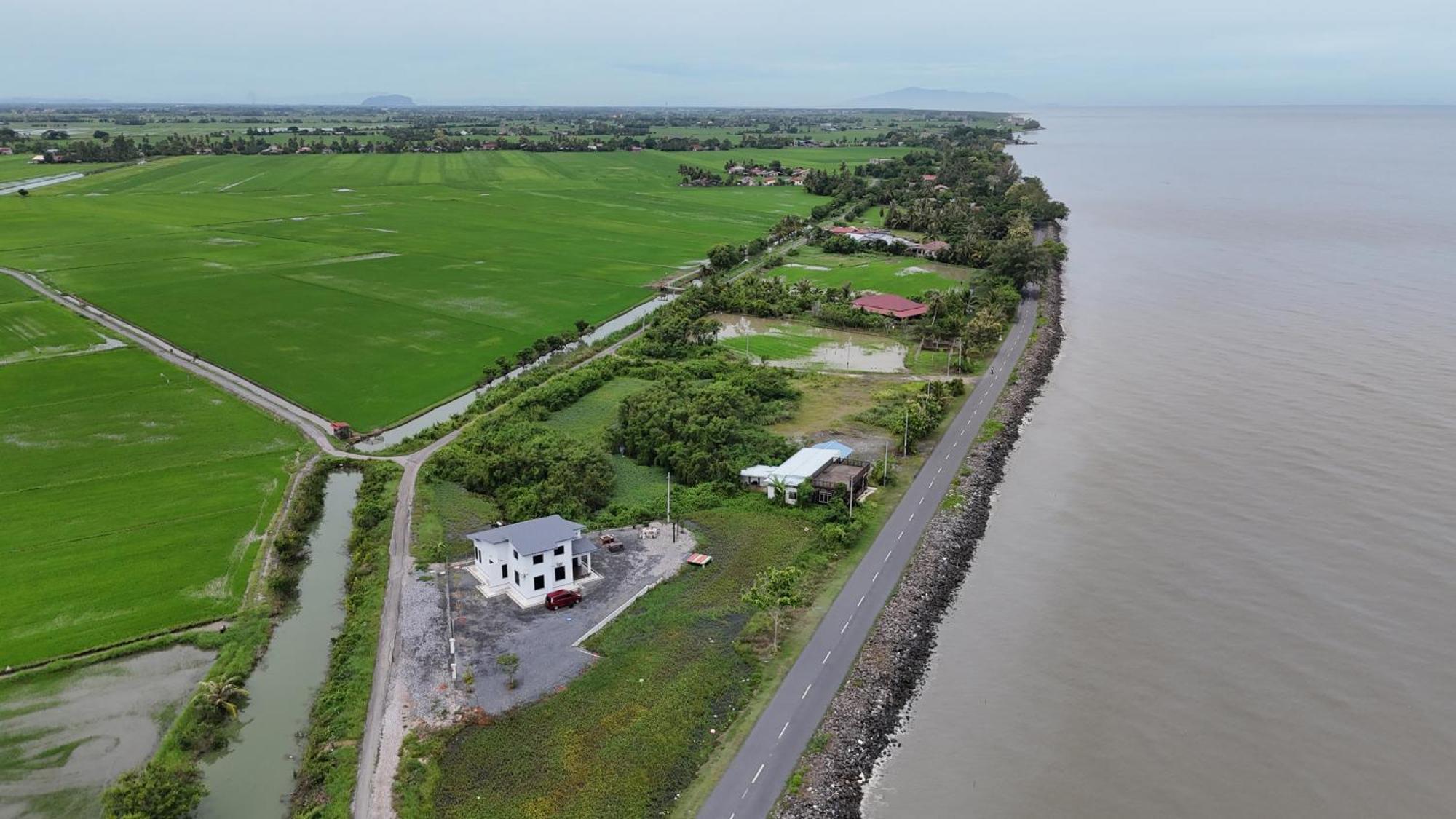 Вилла Rhumah Sungai Belati Simpang Empat  Экстерьер фото